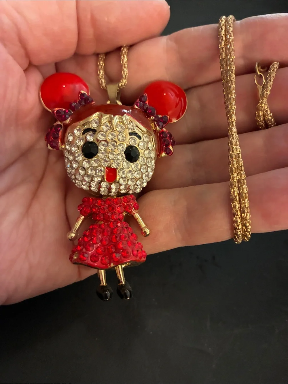 Doll Red Crystal Pendant. Her head turns, dress moves and feet move NWOT